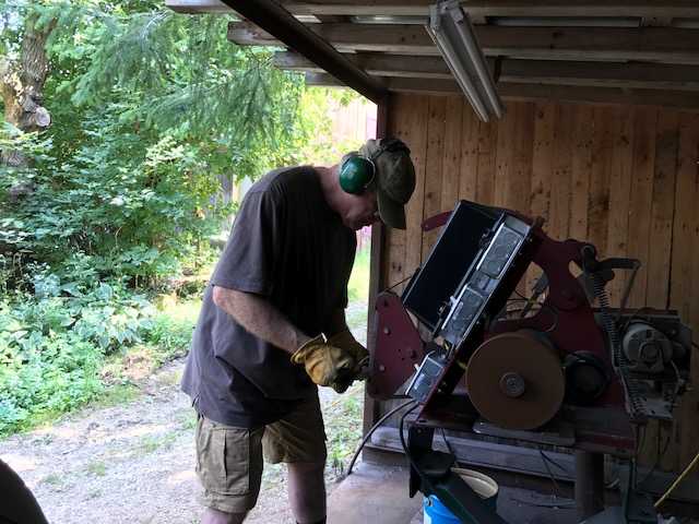 Grinding a Knife Blade at one of the 2 X 72 belt Grinders
