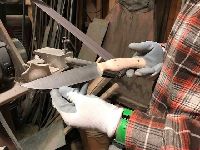 Grinding a knife blade